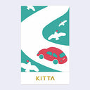 A vertical booklet featuring a whimsical illustration of a red car, white birds, and teal winding paths on a white background, with the name 'KITTA' printed in gold at the bottom.