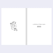 Open book with a black and white illustration on the left page and text on the right page.