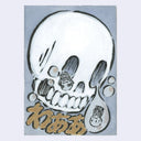 Skull design with Japanese text on a gray background