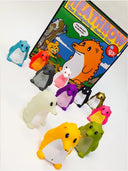 Colorful animal-shaped figures with a 'Heathrow' toy box in the background
