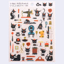 Sheet of decorative stickers with black cat illustrations and various objects on a white background.