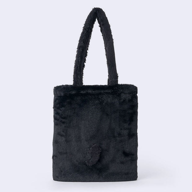 Back view of a fluffy black faux fur tote bag.