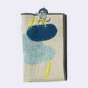 Cream colored rectangle shaped towel with rounded shapes to represent several thunder clouds, with rain coming out of them and 2 lightning bolts. Atop the upper right cloud is a small gray yokai god character, producing a lightning bolt of its own. Folded.