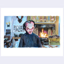 Painting based on a film still from The Shining of a cartoon style Jack standing in one of the main rooms of the lodge with a fire in the background, staring absently.