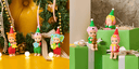 Set of Christmas-themed Sonny Angel figurines on a yellow surface with a decorated tree, and on green gift boxes against a stone wall. They all hold holiday themed items in their hands.