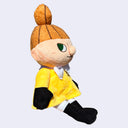 Plush doll of Little My, a character with a mischievous look, a tall orange ponytail and a yellow dress.