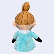 Plush doll of Little My, a character with a subtle smiling expression, looking off to the side. She has a tall ponytail and light blue dress. Back view.
