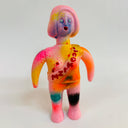 Colorful toy figure with 'Lookizm' written on a sash they are wearing on a white background