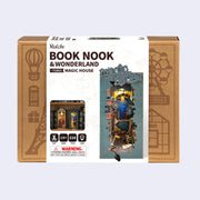 Product packaging of a 3D puzzle kit to build a bookend, scenery features a magical alleyway with small shops for wizards.
