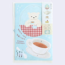 Greeting card that turns into a paper mobile, of a bear drinking tea at a gingham tabel.