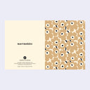 Marimekko patterned paper with brand name on a light gray background