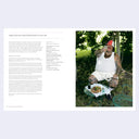 Person sitting outdoors with a salad, next to text on a white background