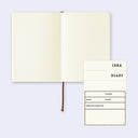 Open notebook with cream-colored pages and a label titled 'Idea Diary' that can be used with the journal.