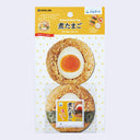 KING.JIM Seasoned Rolled Rice Ball (Hamtama) with Seasoned Boiled Egg and Nori set in its original retail packaging, showing two prepared rice balls on a white patterned card.