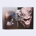 Zine cover for Katsuya Terada's MHZine005, with 2 digital sculpts side by side. One is of a robot head and the other is of a monkey warrior head.