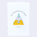 Staple bound zine cover, featuring a simple illustration of a girl in a yellow sweater wearing a party hat and holding a party whistle.