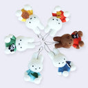Plush keychains of Miffy, 6 different varieties all sitting and holding a different 2D animal. Each Miffy wears a different colored shirt and the animals being held are: duck, dog, penguin, cat, panda and turtle.