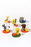 Set of colorful animal figurines on a white background
