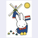 White postcard with an illustration of Miffy holding a Dutch flag and wearing yellow wooden clogs, in front of a windmill.