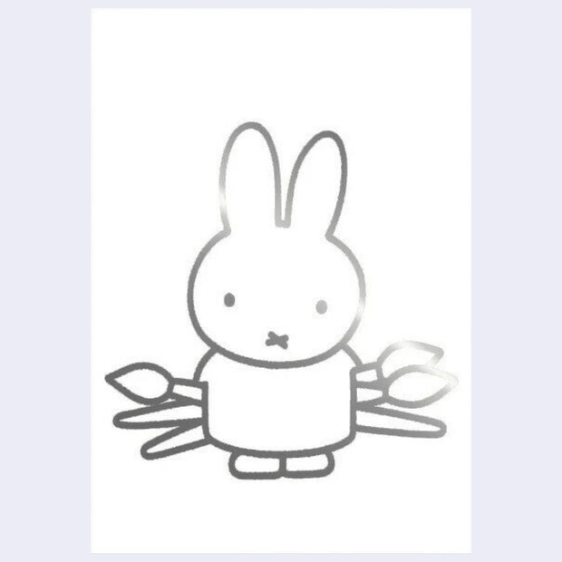 Silver foil line art illustration on white postcard of Miffy standing and holding very large paintbrushes behind her back.