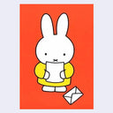 Cartoon rabbit character holding a piece of paper on an orange background