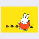 Cartoon rabbit character with a red outfit on a yellow background