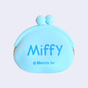 Backside of light blue silicone coin pouch with Miffy written in all lowercase blue font.