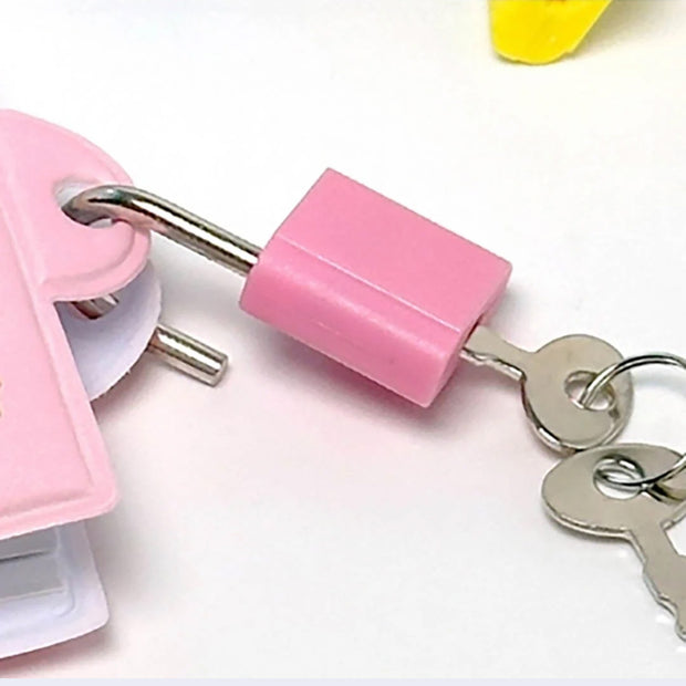 Pink key lock with keys on a white background