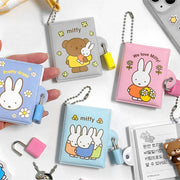 Collection of Miffy-themed keychains and locks on a white background
