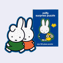 Miffy surprise puzzle blind box, sample design features two miffy characters walking side by side in front of the blind box packaging.