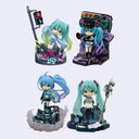 Four chibi-style Hatsune Miku collectible figures with different colorful graffiti-themed bases, arranged on a light gray background.