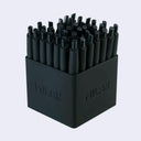 Black pen set with 'MILAN' branding on a light gray background