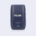 Navy blue plastic case holding an eraser and a pencil sharpener within it, with 'Milan' branding on a light gray background