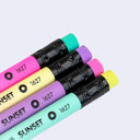 Close up of colorful erasers at the ends of colorful pencils.