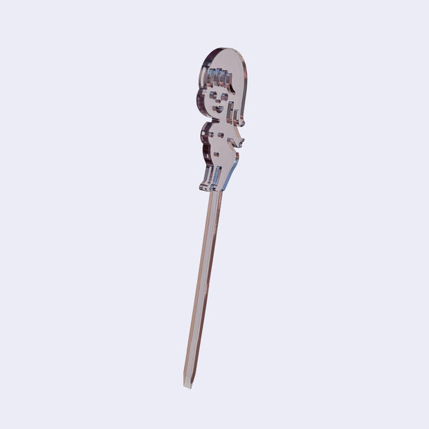 Clear acrylic die cut drink stirrer of a nude cartoon girl, standing with her arms extended behind her back.