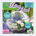 Mini fairy triad product with glass terrarium and flowers on a colorful background