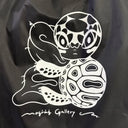 Black polyester bag with white snake and turtle design and 'mograg Gallery' text.