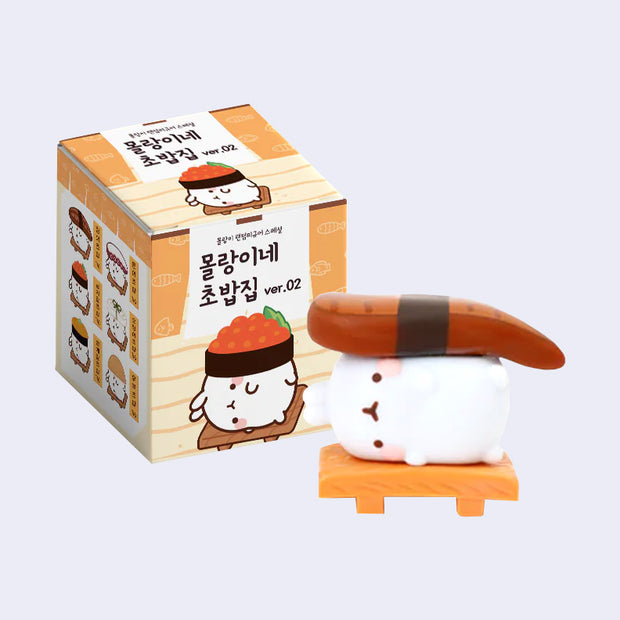 Sushi-themed figurine with packaging on a white background