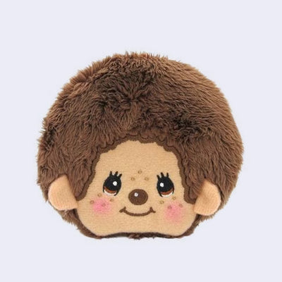 Fluffy coin pouched shaped like a Monchhichi's head with a cute, smiling face.