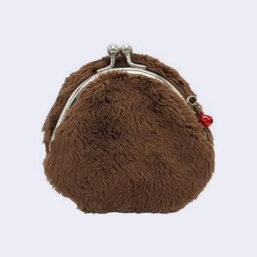 Brown furry coin purse with a red zipper accessory on a light gray background
