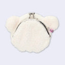 White coin pouch with a metal clasp top opening shaped like a bear's head.