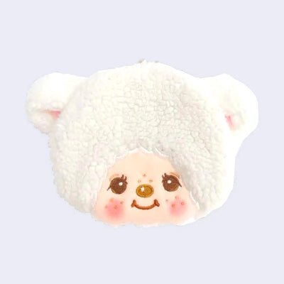 Plush coin pouch shaped like a white sheep's head, with a cute smiling freckled face.
