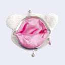 Small fluffy white coin pouch shaped like a bear's head with a pink inner lining.