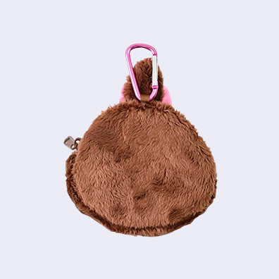 Plush zip top pouch keychain of a smiling Monchhichi girl pouch with a pink bow on a light gray background