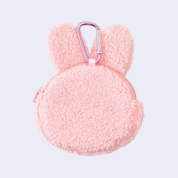 Pink fuzzy coin purse with a carabiner on a light pink background