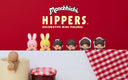 Monchhichi Hippers decorative mini figures with a red background