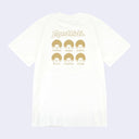 Back of a white t-shirt with a repeating pattern of Moncchichi heads, all with different expressions and text of the expression name below it.