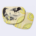 Rounded edge postcard (both front and back shown) with an illustration of 3 birds and a yellow and gray concentric circle design)