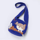 Dark blue shoulder bag with a graphic on the front of a grouse, a bird with a very round body and swirling feathers.