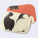 Rounded edged postcard with black and white imagery of 2 fluffy cats.